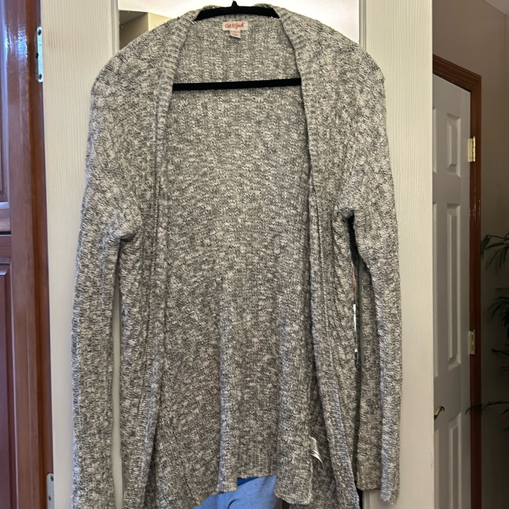 Grey and white sweater lightly used in good condition
